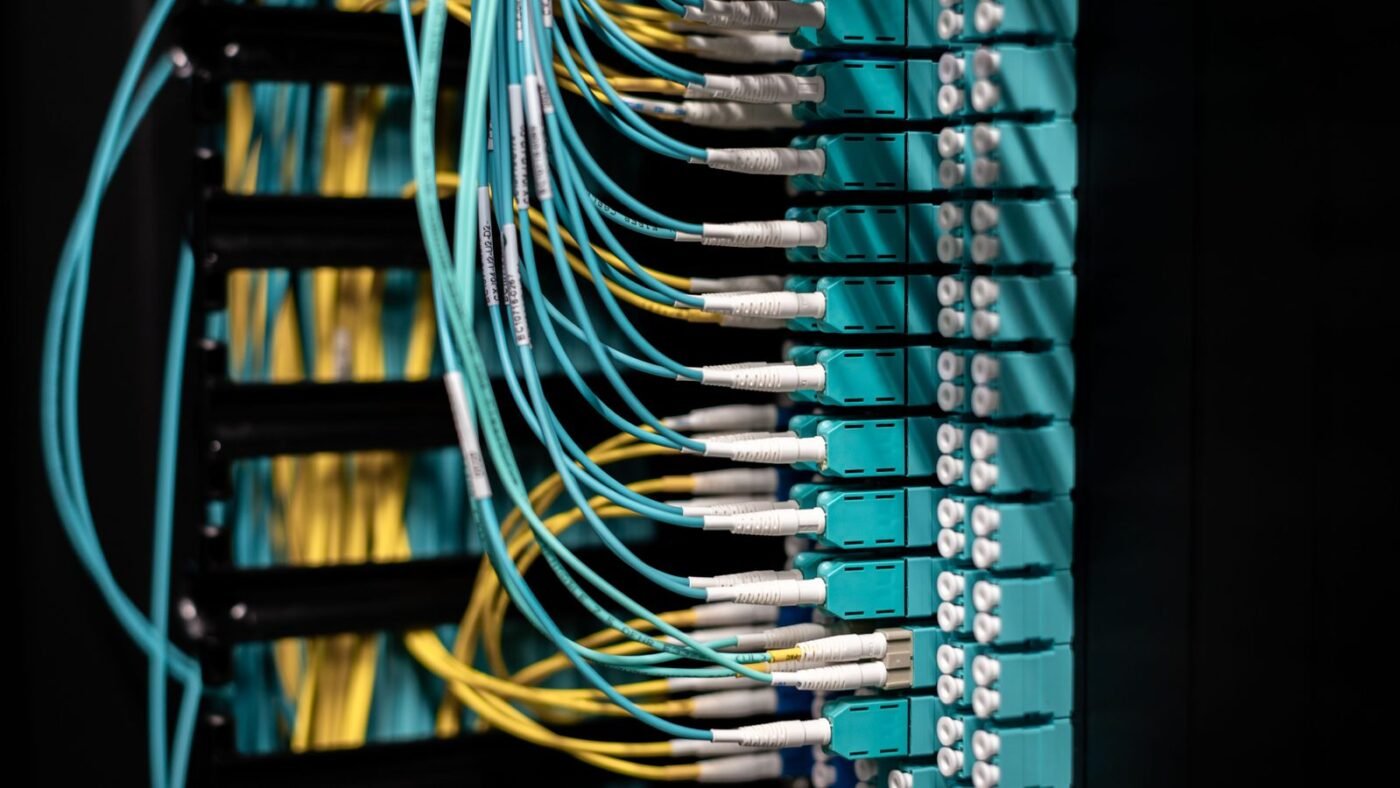 Network cables connected to a patch panel in a data center