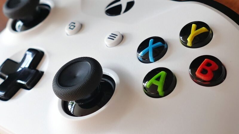 Close-up of an Xbox controller showing its buttons and joysticks